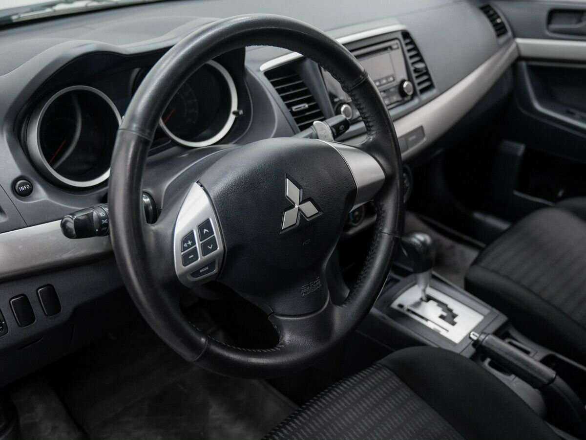 Mitsubishi Lancer с пробегом — 2012 год. Фото: #11