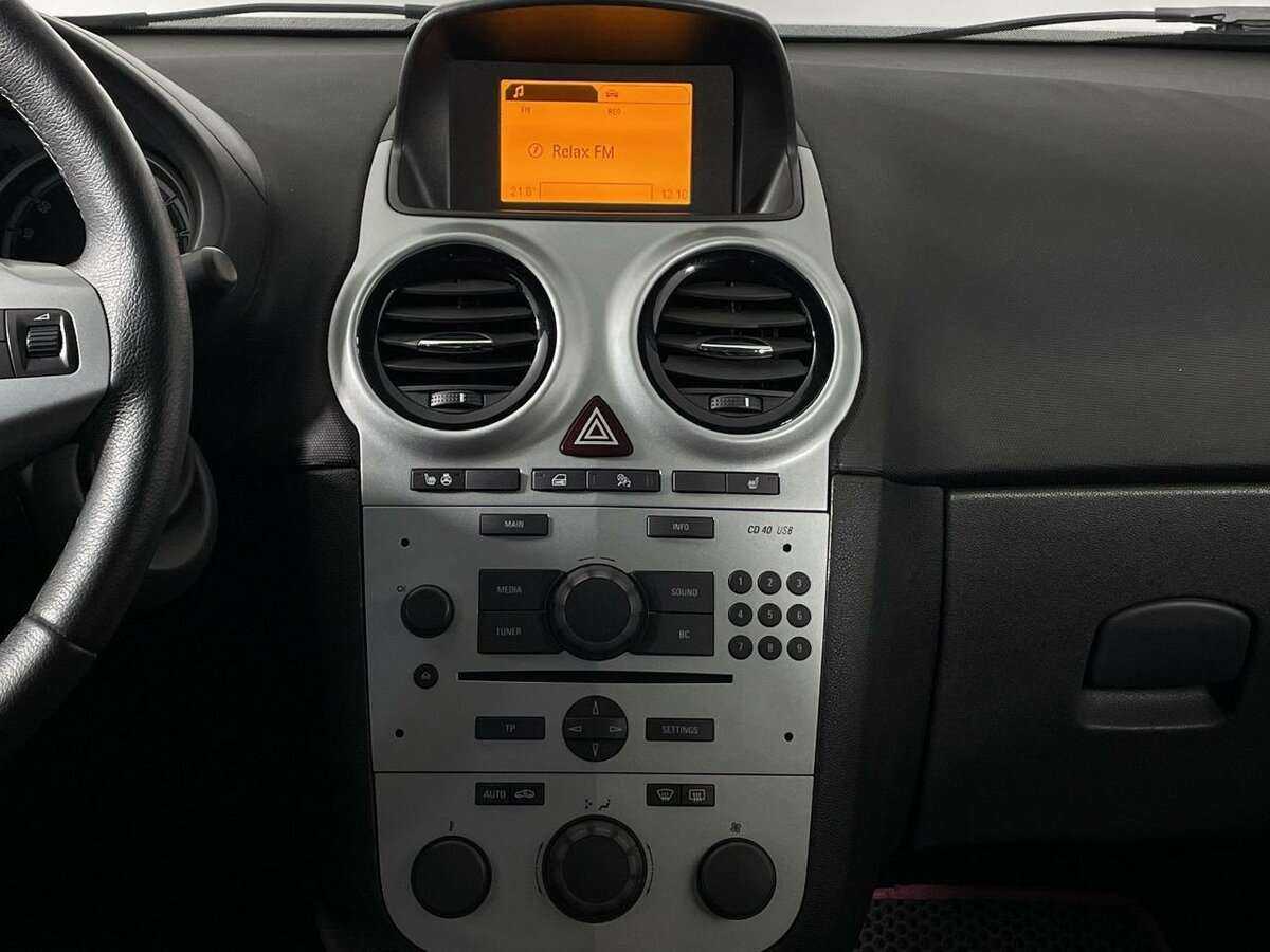 Opel Corsa с пробегом — 2013 год. Фото: #11