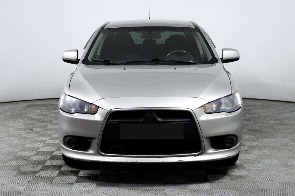 Mitsubishi Lancer с пробегом — 2012 год. Фото: #1