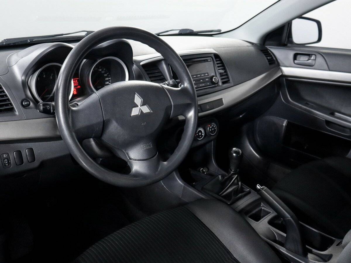 Mitsubishi Lancer с пробегом — 2014 год. Фото: #12