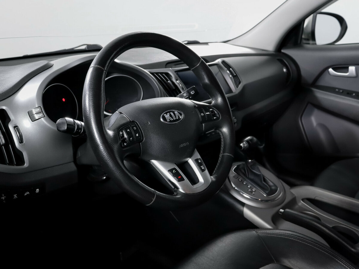 Kia Sportage с пробегом — 2015 год. Фото: #13