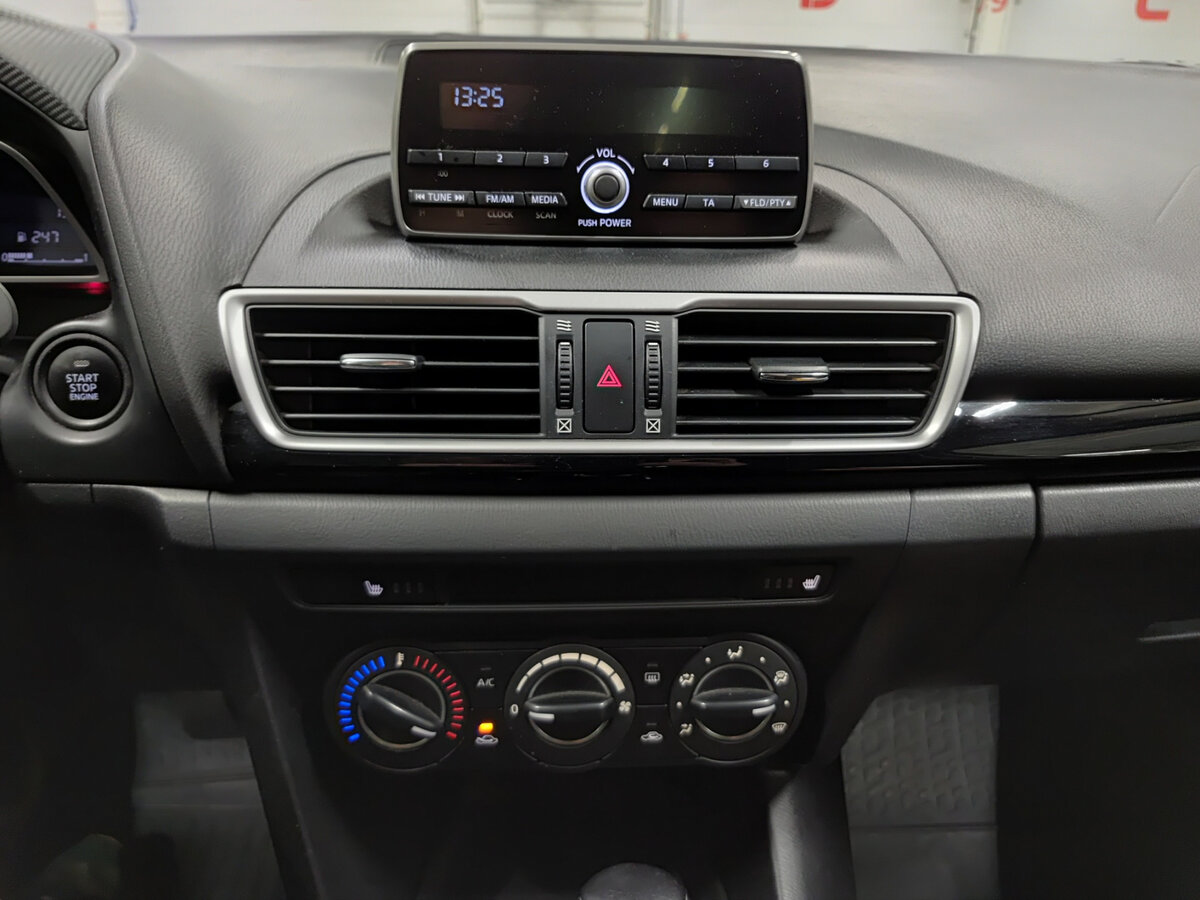 Mazda 3 с пробегом — 2014 год. Фото: #14